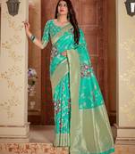 Turquoise woven banarasi silk saree with blouse