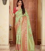 Light green woven banarasi silk saree with blouse