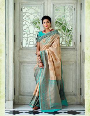 Cream woven silk blend saree with blouse 1