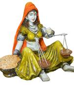 Rajasthani lady with Taraju