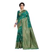 Green woven banarasi silk saree with blouse
