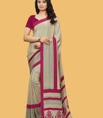 Beige printed crepe saree with blouse