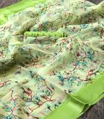 Green printed organza saree with blouse