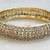 Bollywood style plain gold & stone studded pair of bangles