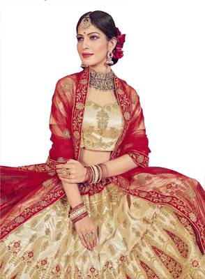 Beige embroidered satin semi stitched lehenga 2