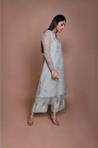 Show Shaa Sea green Chnaderi FLORAL SHEER OVERALL WITH GEOMETRICAL Stripe tunic and embroided pants.