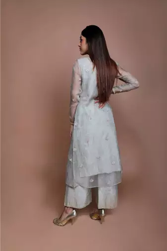 Show Shaa Sea green Chnaderi FLORAL SHEER OVERALL WITH GEOMETRICAL Stripe tunic and embroided pants.