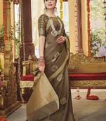 Brown woven silk blend saree with blouse