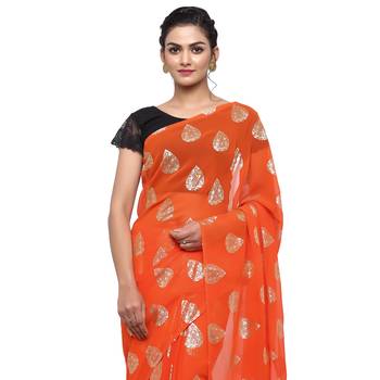 Orange printed faux georgette saree with blouse 3