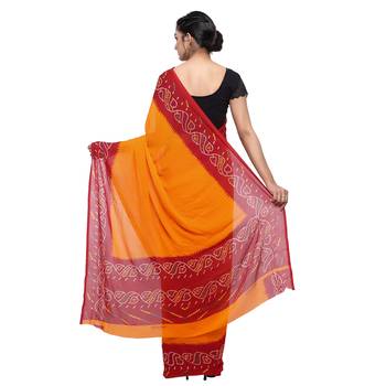 Orange printed faux georgette saree with blouse 2
