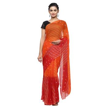 Orange printed faux georgette saree with blouse 1