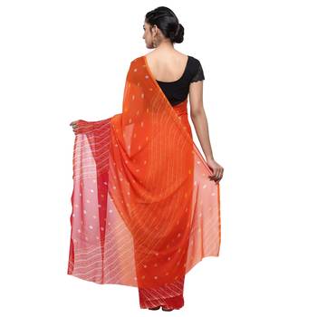 Orange printed faux georgette saree with blouse 2