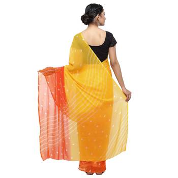 Yellow printed faux georgette saree with blouse 2