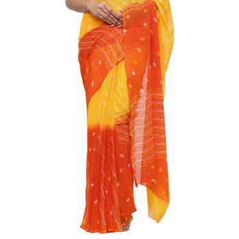 Yellow printed faux georgette saree with blouse 4