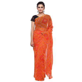 Orange printed faux georgette saree with blouse 1