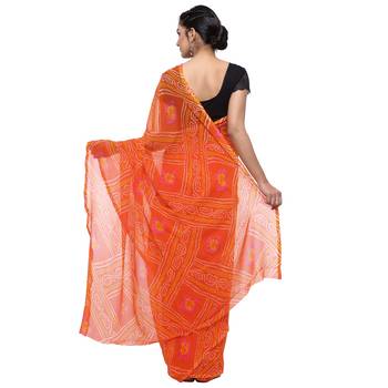 Orange printed faux georgette saree with blouse 2