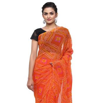 Orange printed faux georgette saree with blouse 3