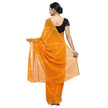 Mustard printed faux georgette saree with blouse 2