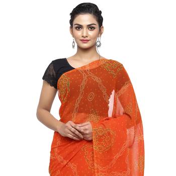 Orange printed faux georgette saree with blouse 3