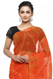 Orange printed faux georgette saree with blouse