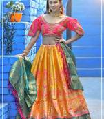 Yellow embroidered banarasi silk semi stitched lehenga