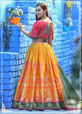 Yellow embroidered banarasi silk semi stitched lehenga 2