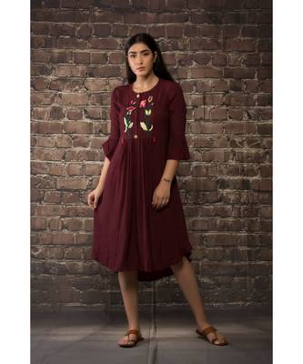sulochana jangir maroon linen silk tunic with lily flower hand embroidery. 1