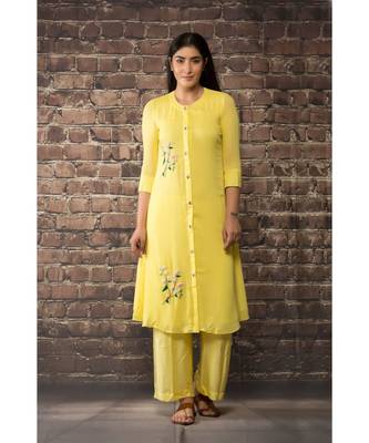 sulochana jangir yellow linen georgette kurta with geeth work paired with matching pants. 1