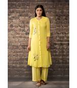 sulochana jangir yellow linen georgette kurta with geeth work paired with matching pants.