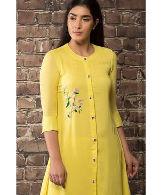 sulochana jangir yellow linen georgette kurta with geeth work paired with matching pants. 3