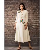 sulochana jangir white linen georgette  dress with aari work.