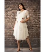 sulochana jangir white handloom linen twill tunic with 3 flower hand embroidery.