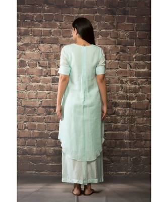 sulochana jangir ice blue handloom linen twillkurta with 3 flower hand embroidery paired with maching pants. 2