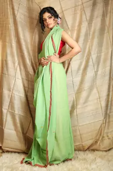 Light green woven cotton saree with blouse