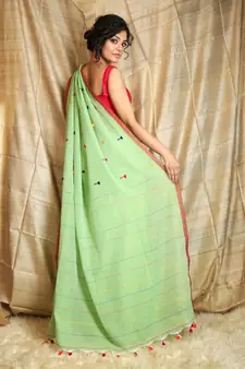 Light green woven cotton saree with blouse