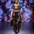 Charu Parashar Navy blue printed top with printed flare style dhoti and and hand embellished jacket