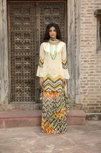 Cream Printed Kurta With Printed Sharara And Dupatta