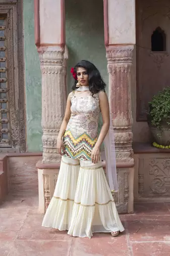 Cream Printed Sleveless Kurta With Sharara And Dupatta