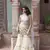 Charu parashar Cream printed sleveless kurta with sharara and dupatta
