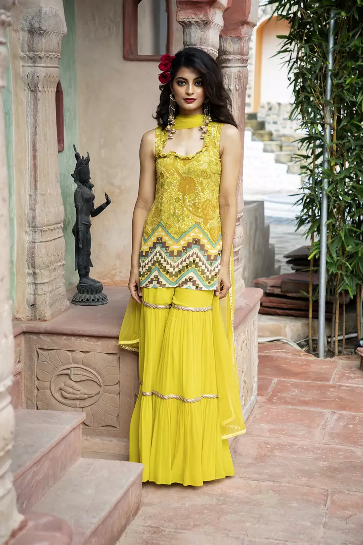 Charu parashar Yellow printed sleveless kurta with sharara and dupatta