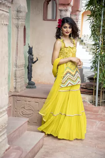 Yellow Printed Sleveless Kurta With Sharara And Dupatta