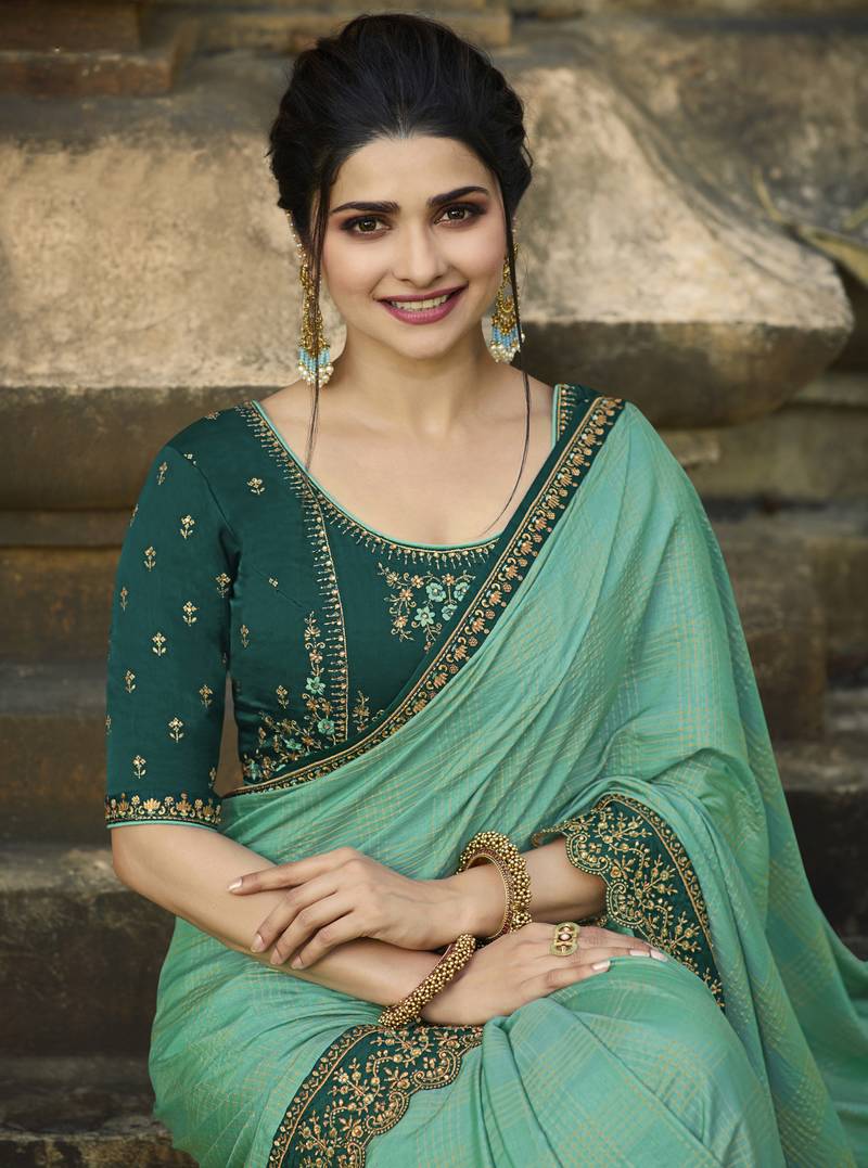 Turquoise embroidered silk blend saree with blouse - VRITIKAMESMER ...