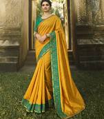 Mustard embroidered chiffon saree with blouse