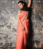 Peach woven silk blend saree with blouse