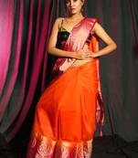 Orange woven silk saree with blouse