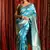 Cyan woven silk saree with blouse