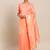 Peach woven silk blend saree with blouse