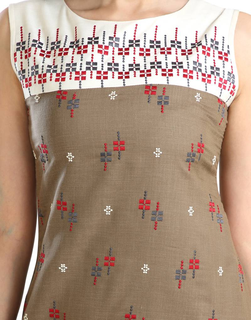 women Straight Embroidered Rayon Beige Kurti