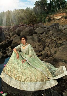 Green sequins net semi stitched lehenga 4