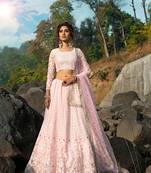 CAPTIVATING LIGHT PINK SEQUINS, ZARI, AND THREAD EMBROIDERY NET SEMI STITCHED WEDDING LEHENGA